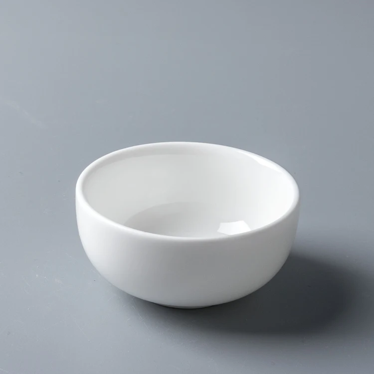 white ceramic dipping bowls