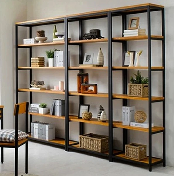 Vintage Wrought Iron separators do the old wood bookcase