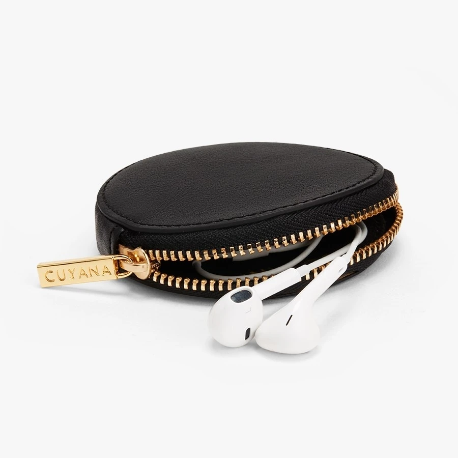 Source streamlined round leather coin pouch with Micro suede interior  lining on m.