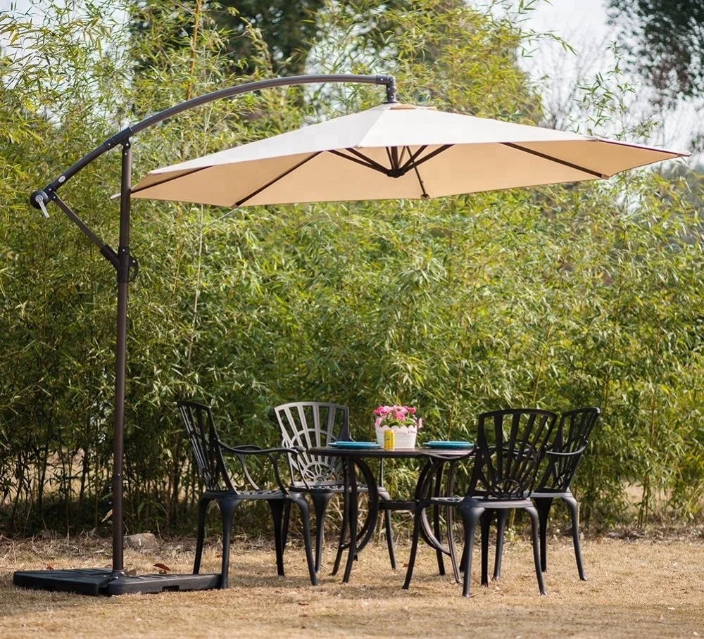 grand patio deluxe 10 foot curvy aluminium offset umbrella Outdoor 12 FT Cantilever Sunbrella Umbrella, Patio the reinforced pole is made from powder coated aluminium.The outer umbrella has wheels for easy movement and the base needs to be filled with 265 lbs of sand and water to secure the umbrella Grand Patio Deluxe Curvy Aluminum