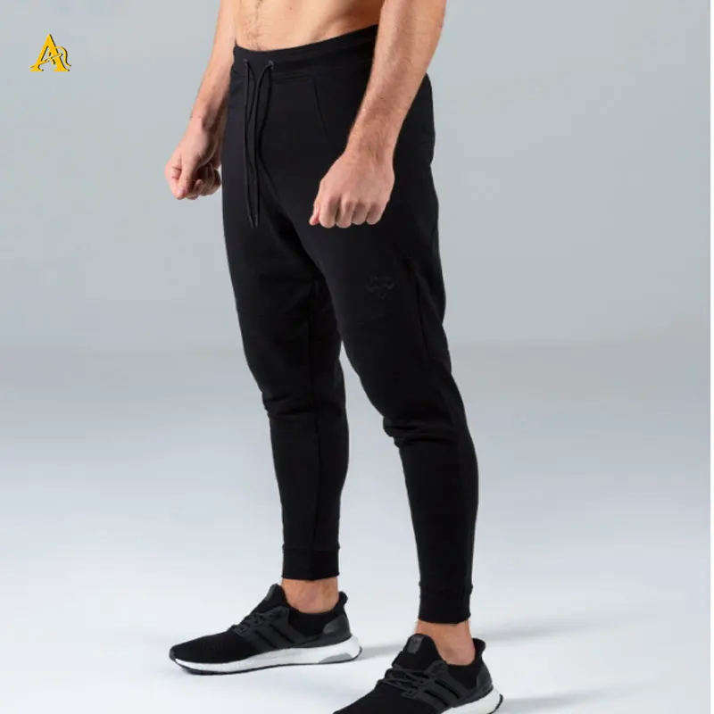 Pantalones De Jogging Ajustados Para Hombre,Ropa Deportiva Para Gimnasio,De  Alta Calidad,Oem - Buy Gym Fitness Wear Top Quality Tracksuit Bottoms  Paneled Joggers,Tapered Fit Mens Jogger Pants,Hot Sale Slim Fit Sweat Pants  Gym