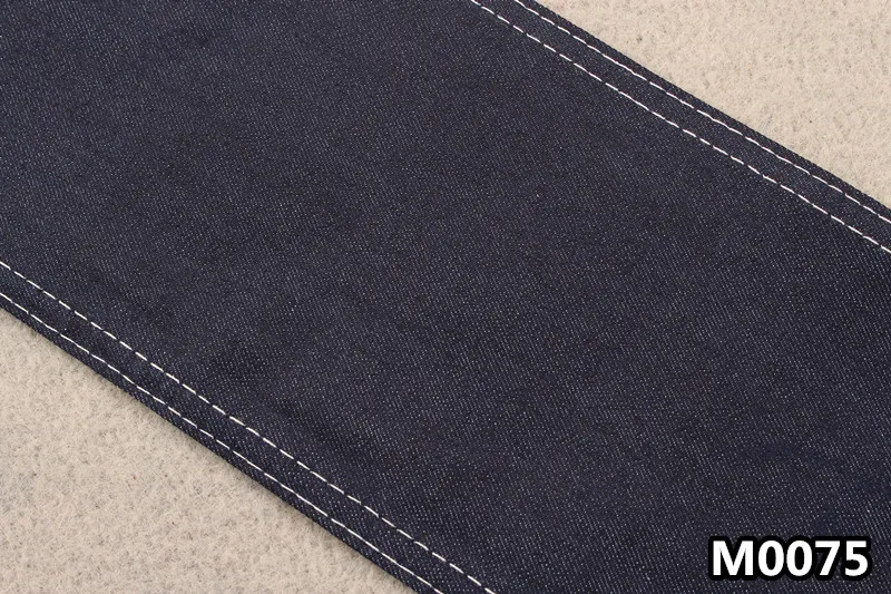 
Хорошо тянущаяся джинсовая ткань из хлопка и вискозы и спандекса с деформацией 