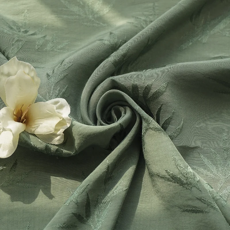 
Новые продукты, однотонная окрашенная Кленовая листовая зеленая жаккардовая вискозная ткань для изготовления платья 