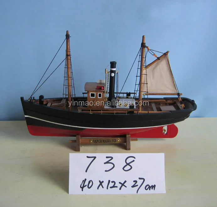 Wooden fishing boat model with sail