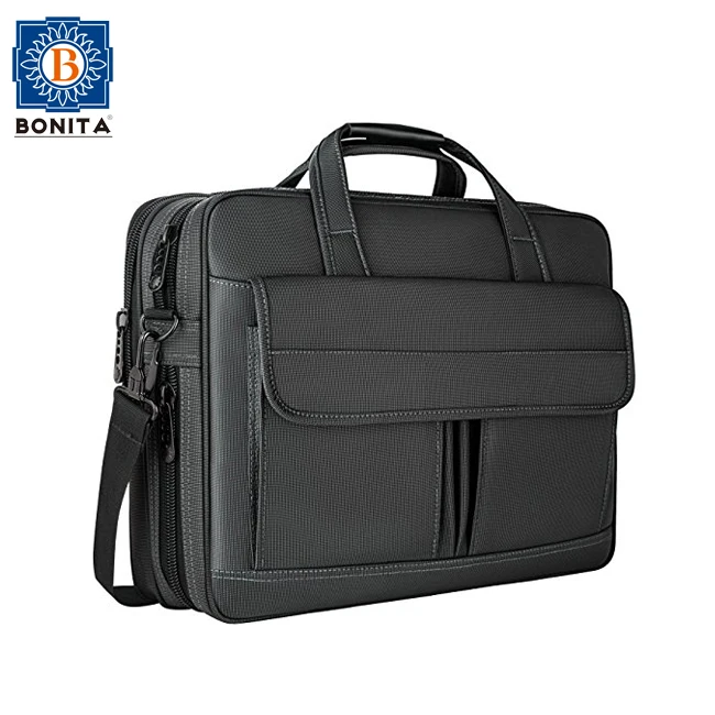 laptop and paperwork bolsa