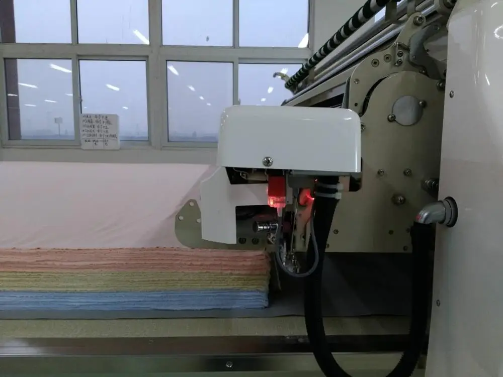 Полностью автоматическая машина распространения ткани для вязать и тканые