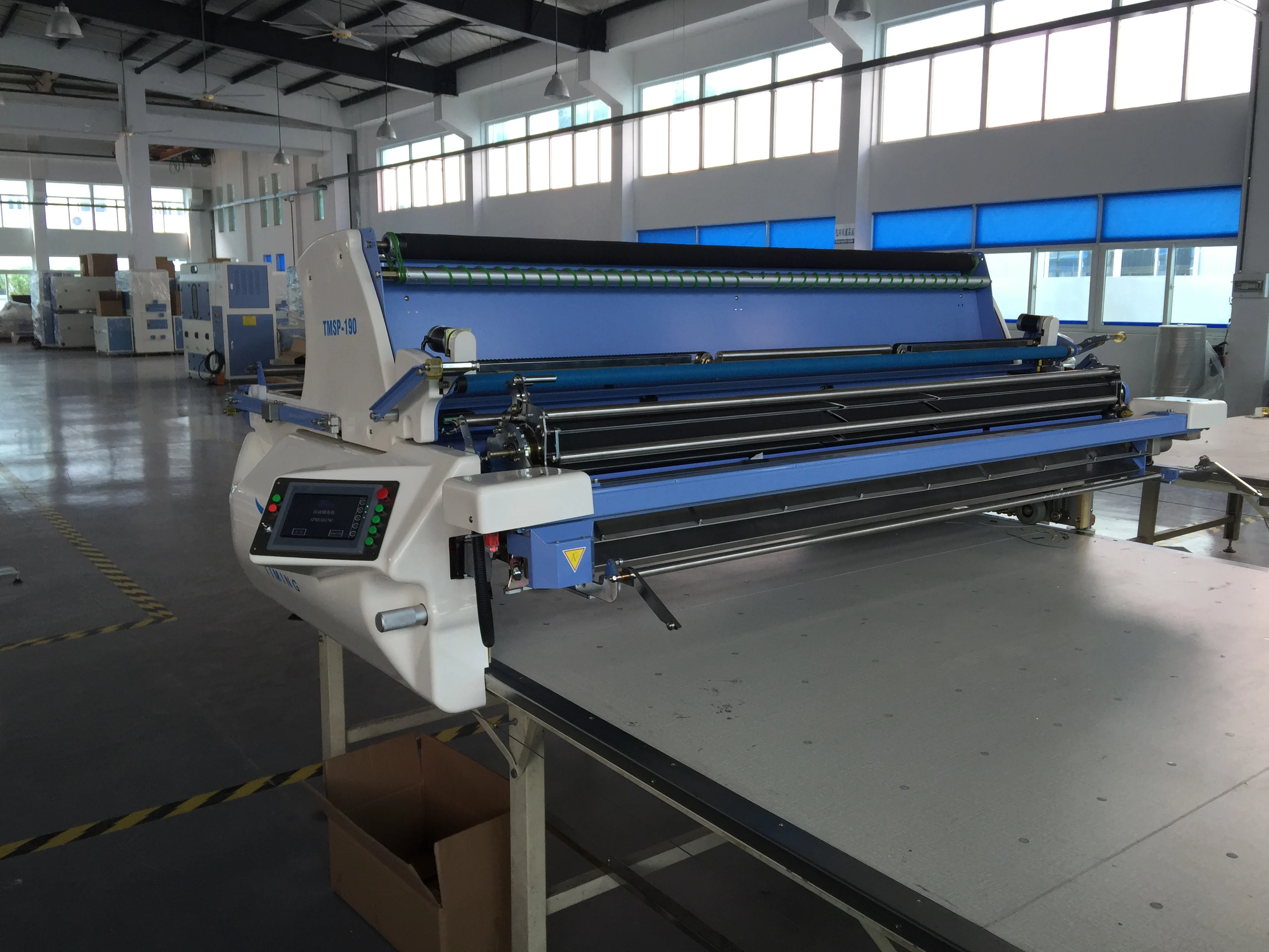 Полностью автоматическая машина распространения ткани для вязать и тканые