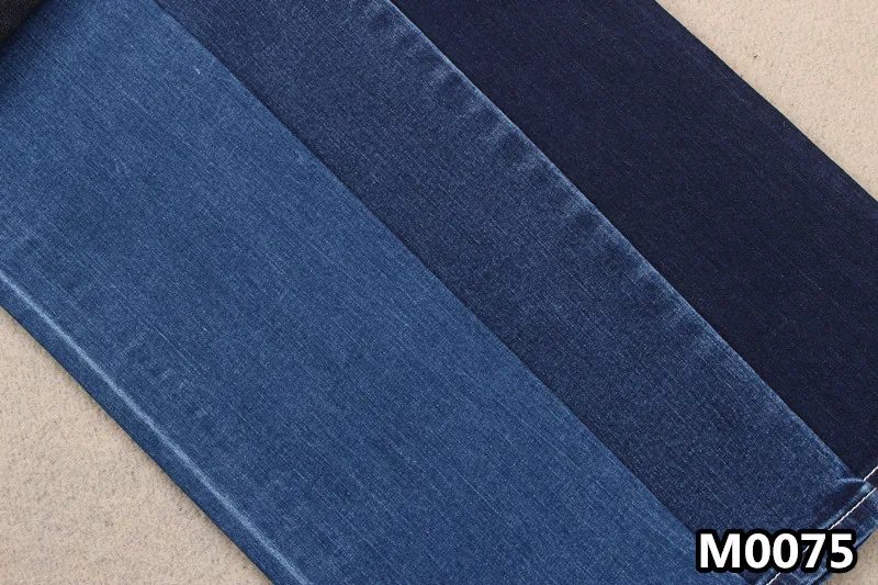 
Хорошо тянущаяся джинсовая ткань из хлопка и вискозы и спандекса с деформацией 