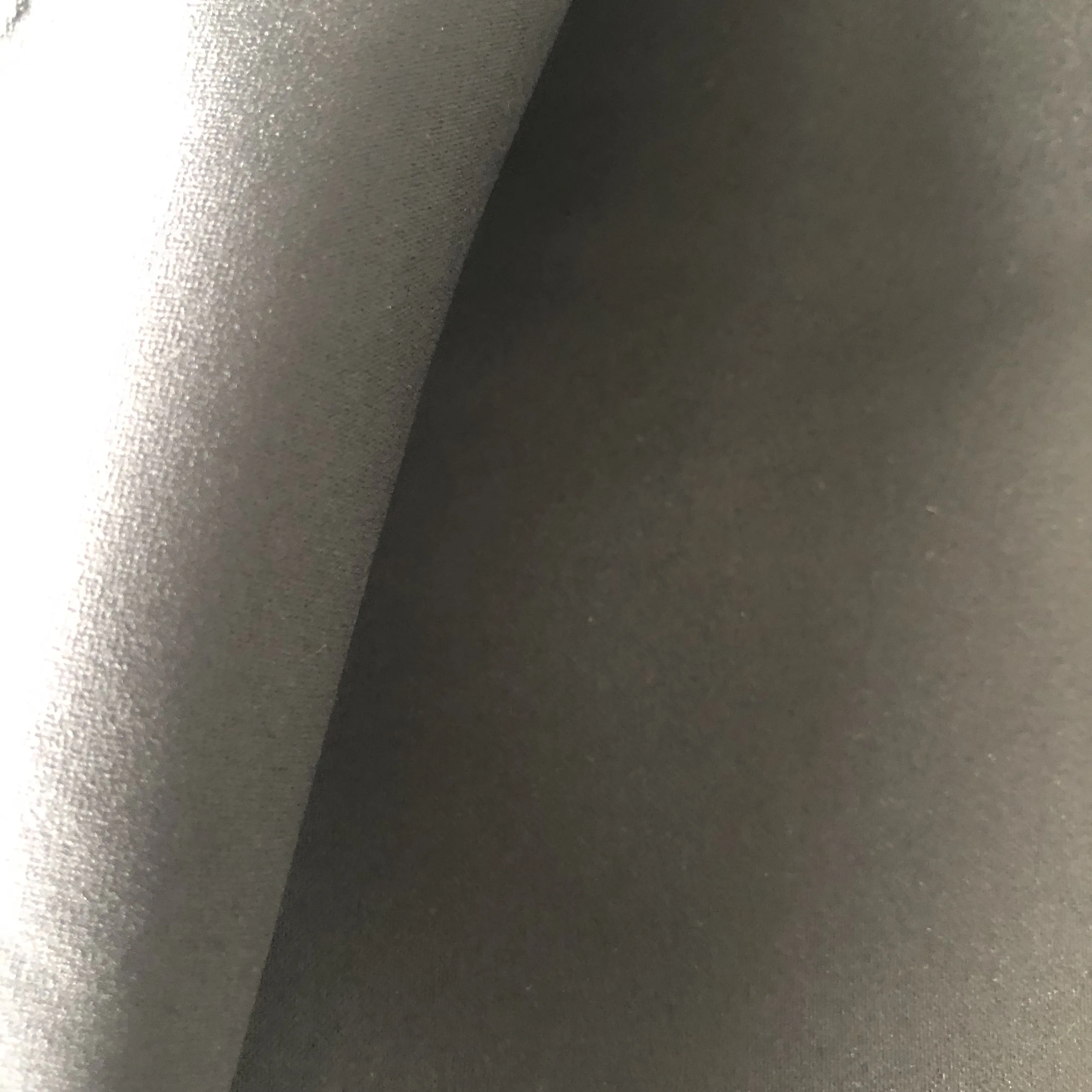 Engros 100% polyester satinvævet mikrofiber ferskenskind til shorts