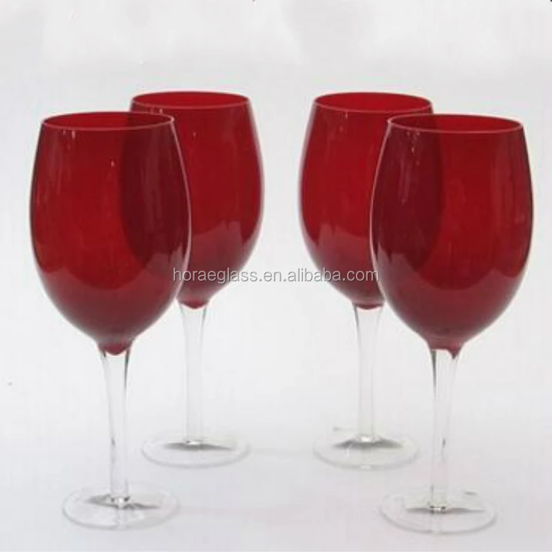 Featured image of post Red Colored Wine Glasses - Red glitter balls in a large wine glass against the background of a decorated christmas tree.