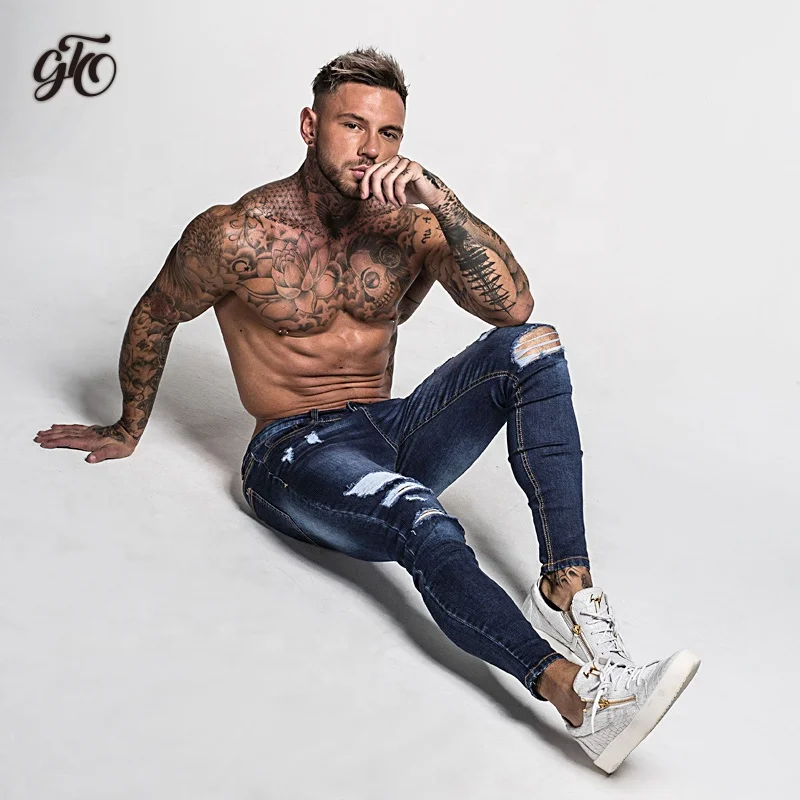 Shop Our Wholesale Frayed Men's Jeans Perfect for Streetwear