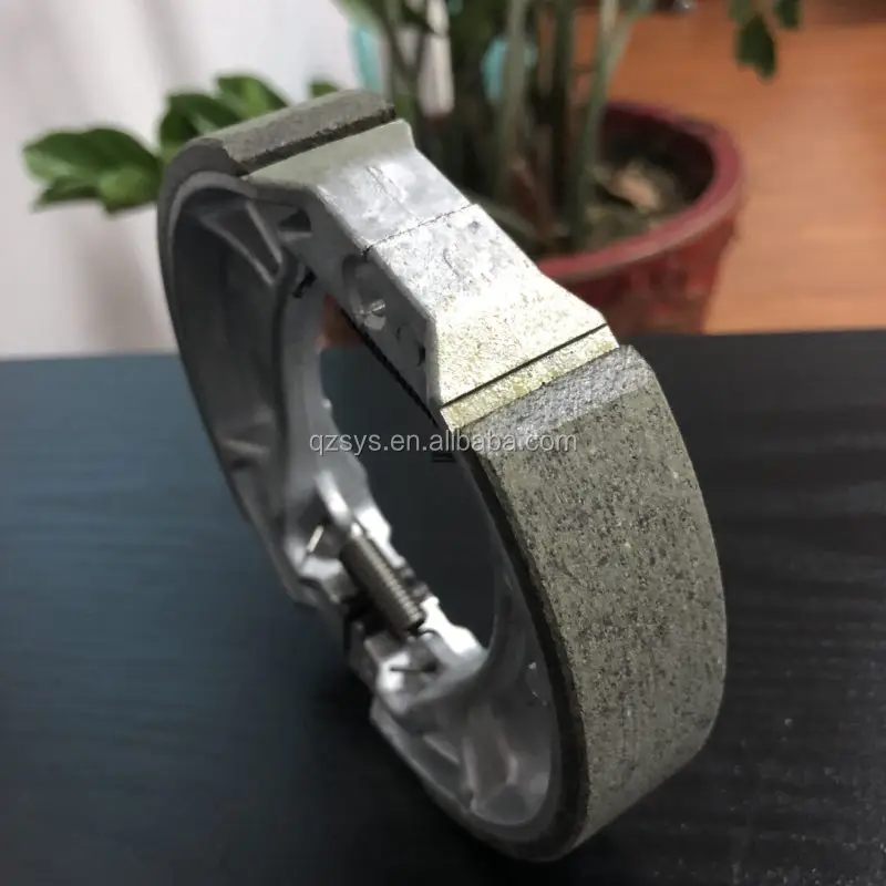 Заводская цена Прямая поставка запчастей для мотоциклов барабанная тормозная колодка YBR125