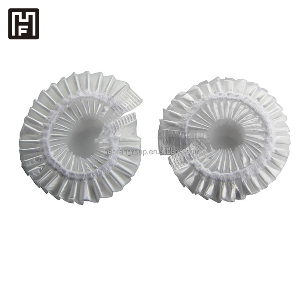 Одноразовая душевая шапочка для