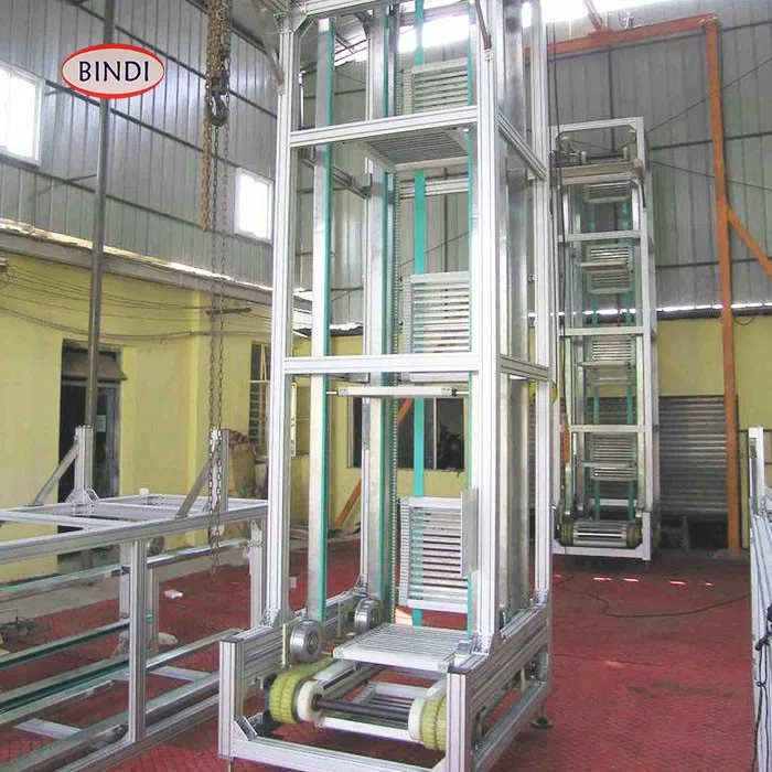 C Configuration Continuous Vertical Lift Conveyor with Adjustable Speed Stainless Steel Belt Material