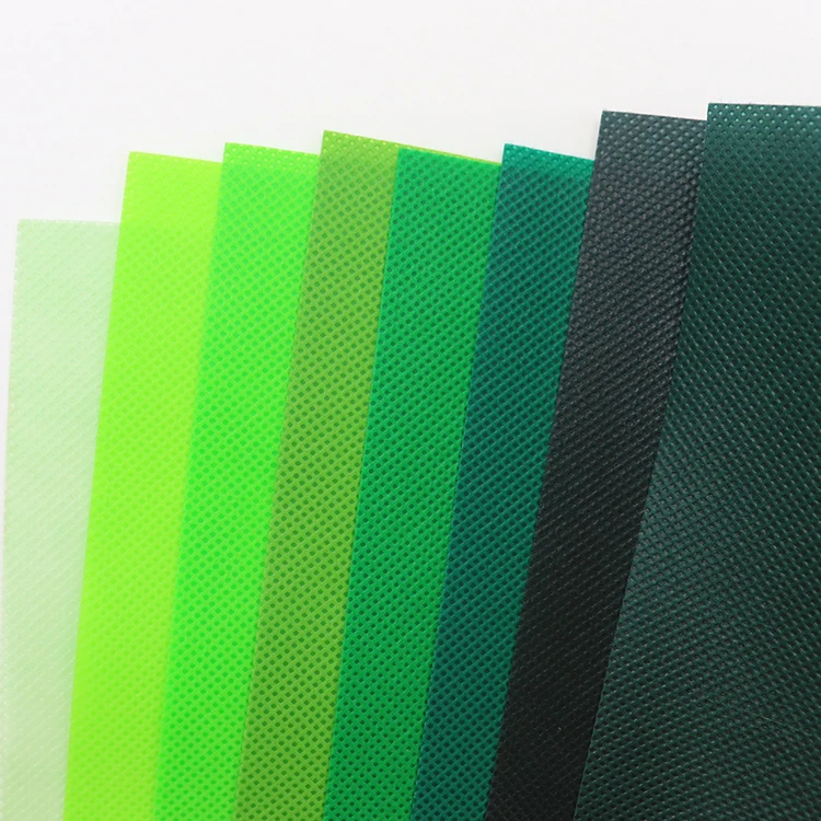 Colorful non woven cloth pp spunbond nonwoven fabric for bags making china manufacturer