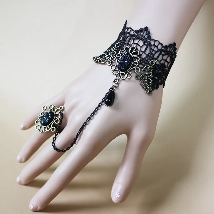 Shoshaa GoldToned handcrafted Kundanstudded haathphool Bracelet with