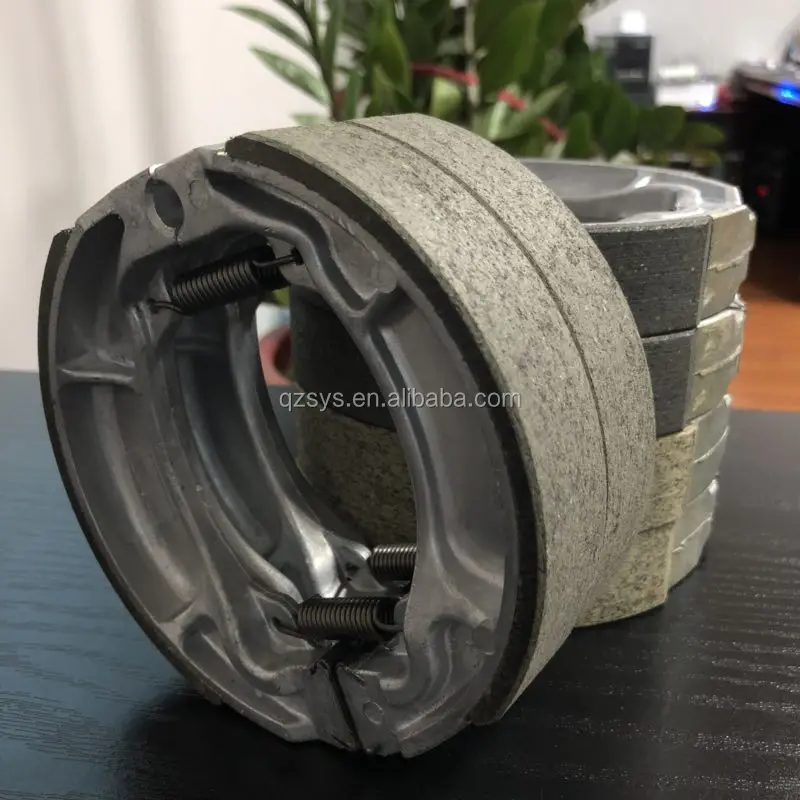 Заводская цена Прямая поставка запчастей для мотоциклов барабанная тормозная колодка YBR125