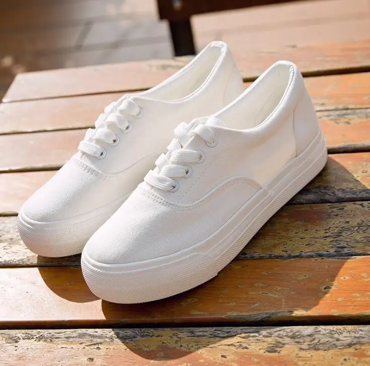 girl white canvas shoes