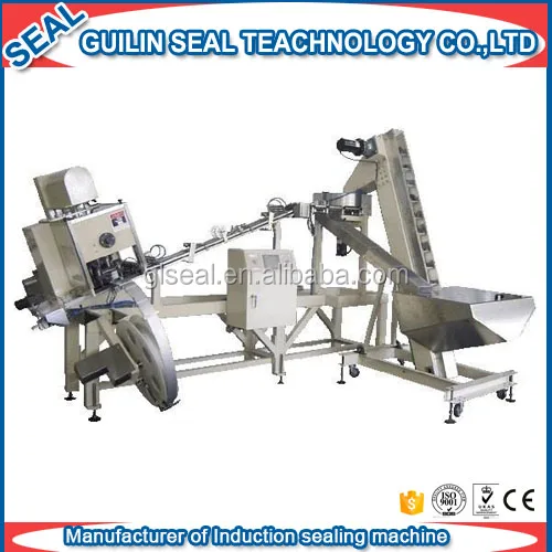 Машина для вставки пластиковых крышек бутылок, ватных уплотнений в крышки