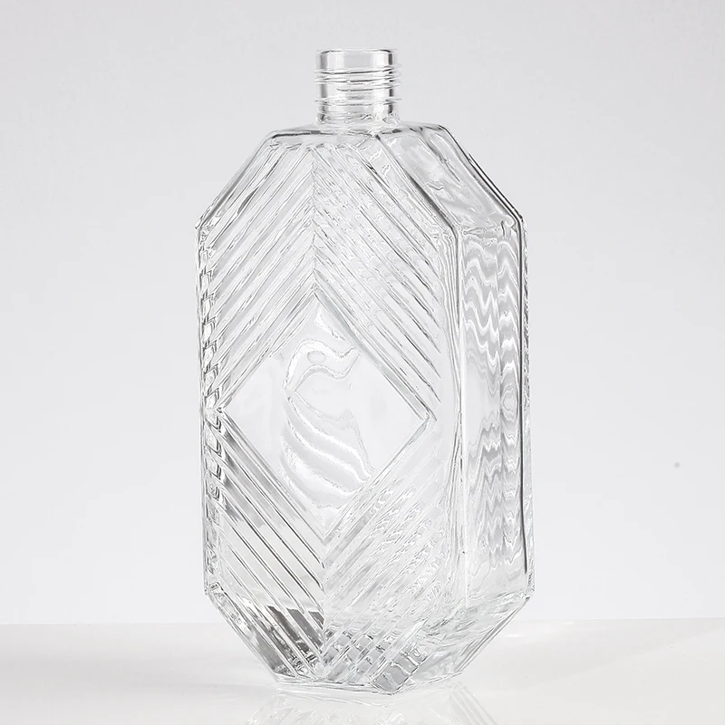 Fashion Design Exquisite Emboss 750ml New Alcohol Glass Bottle With Caps