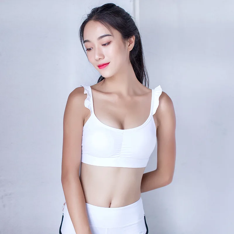 Lexica - Lovely thai woman wearing silver sports bra and blue
