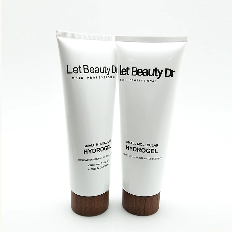 Plastic white cosmetic cream PE packaging tube with wood cap 200ml