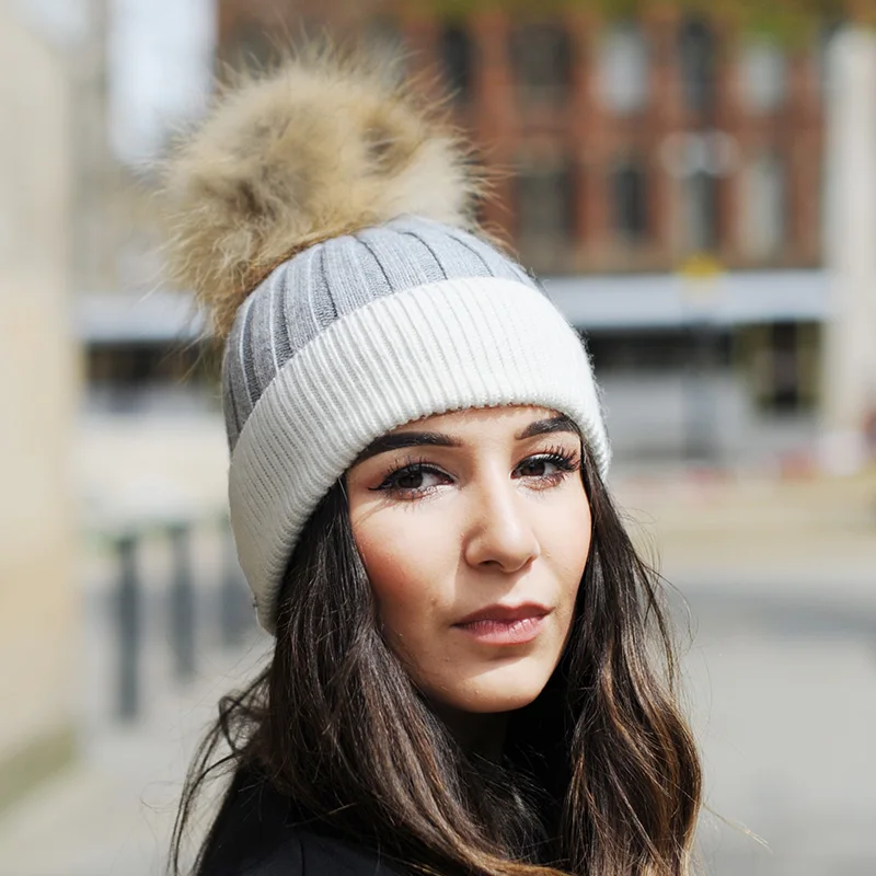 hats with fur ball on top