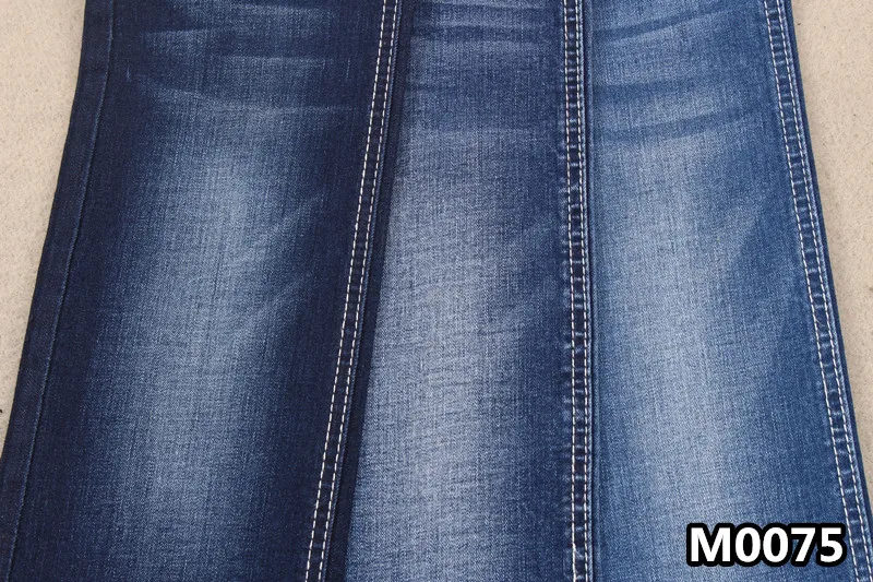 
Хорошо тянущаяся джинсовая ткань из хлопка и вискозы и спандекса с деформацией 