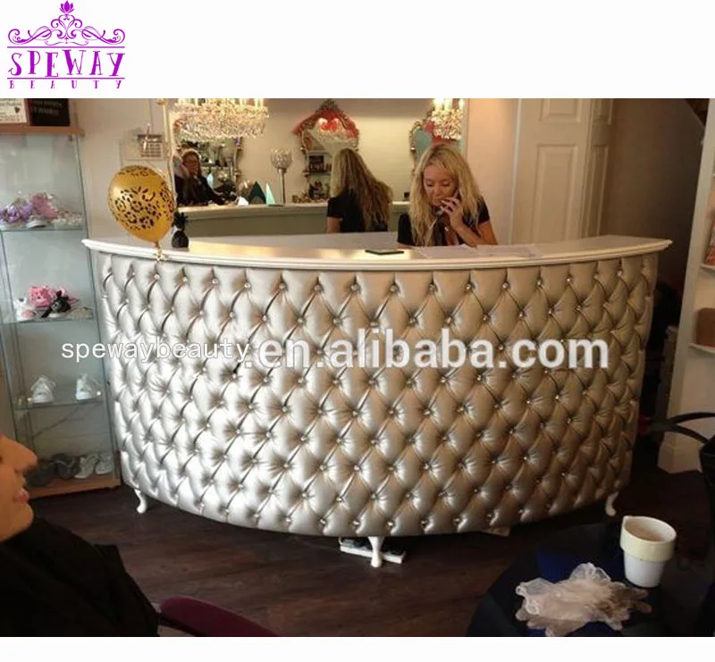 tufted salon reception desk