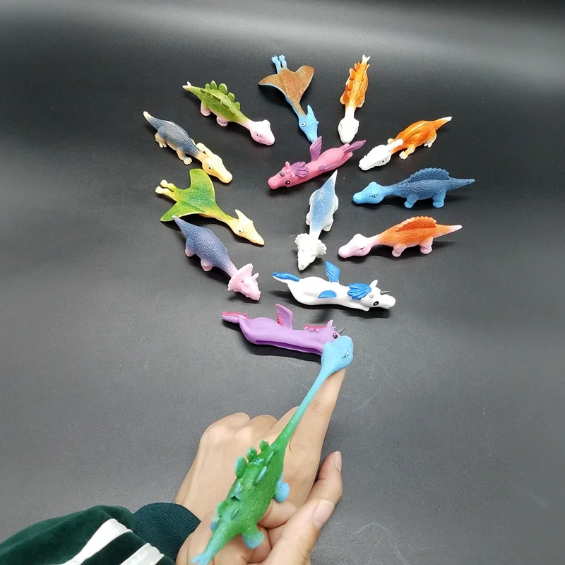 Source Jouet coloré pour enfant, jeu de rotation des doigts, tir de  dinosaure, fronde, 1 pièce, pour la Promotion, nouvelle collection on  m.alibaba.com