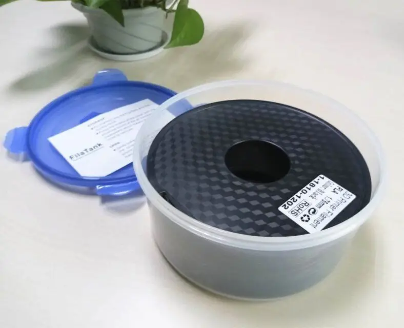 Vacuum sealed filament container