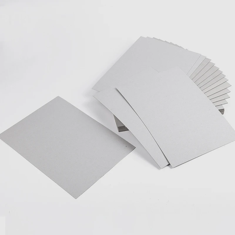 Размеры серой бумаги. Серая бумага для принтера. Картон серый 2 мм. Переплетный картон серы. Серая коробка бумаги.