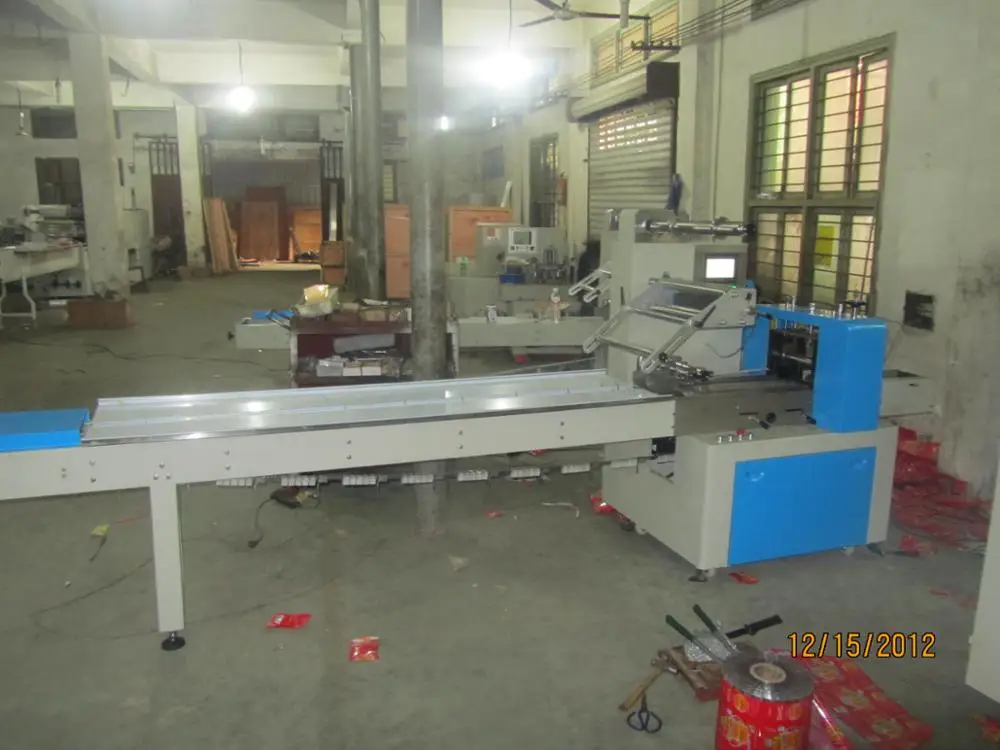 KD-350 Automatic Flow Pillow Packing Machine for Sugar Noddle Cookie Apparels Chemicals Commodity Textiles Plastic Film Motor