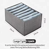Caja de almacenamiento gris de 7 compartimentos.