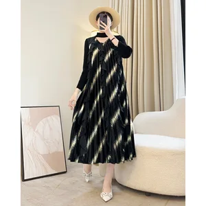 Trending: Long - Sleeved Black Miyake Pleated Dress with Stunning Gold Stripes & Ruffled Details Women's Elegant Dress
