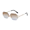 Montatura dorata/lente marrone blu