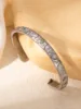 Steel with colored diamonds