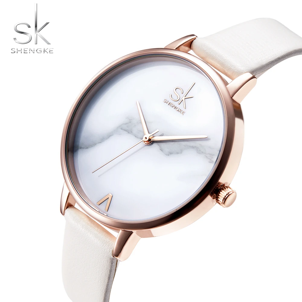 Buy SHENGKE Elegant Creative Pearl Shell Dial Ladies Fashion Analog Wrist  Watch for Women at Amazon.in