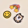 Rainbow smiley face black dog embroidered patch