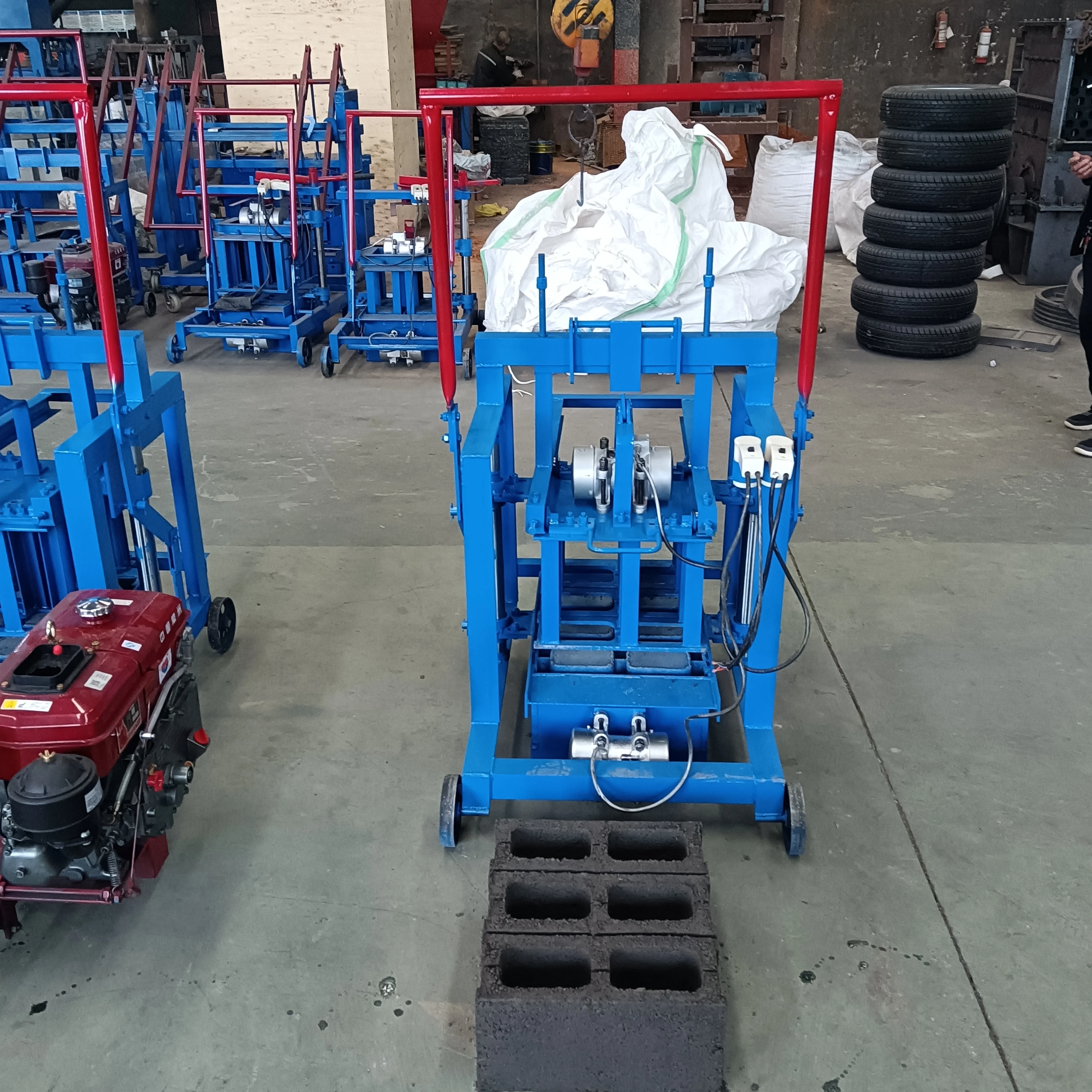 Egg Laying Mobile Manual Brick Machine Concrete Cement Brick Making Machine Small Hollow Block Making Machine for Sale in USA
