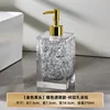 Silver-gray/golden pump head