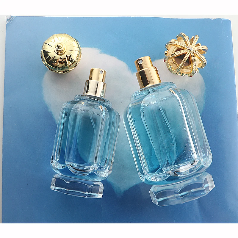 Luxury 50ml 100ml Polygon clear Empty Thick Bottom Dubai Perfume Glass Bottle  with Crimp Sprayer Crown Zamac Lid