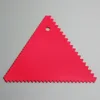 Raschietto triangolare rosso per denti