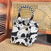 Playful panda-buckle bag