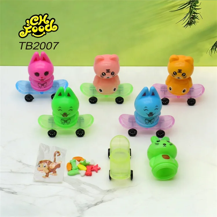 Wholesale and OEM Cartoon Animal Shape Scooter Toy with Fruit Flavor Tablet Candy and Tattoo for Kids