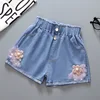 Pantaloncini elasticizzati a fiori grandi