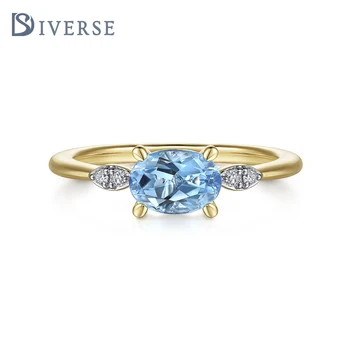 Doyonds S925 Silver Elegant Ring with Oval Blue Gemstone and Triplet Diamond Accents - Golden Embellishments for a Luxurious