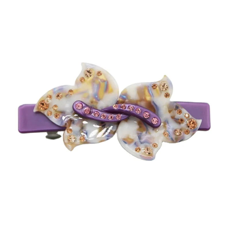 Заколка для волос с разноцветными бабочками