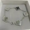 Oro bianco grigio + diamante