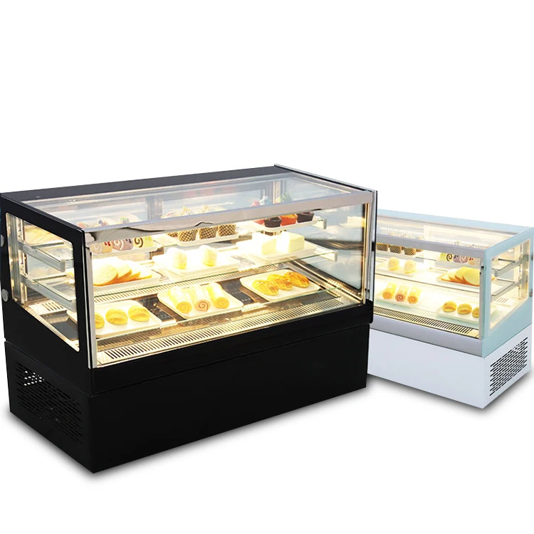 Different various types of sweet cakes in pastry shop glass display.  Various different types of sweet cakes in pastry shop | CanStock